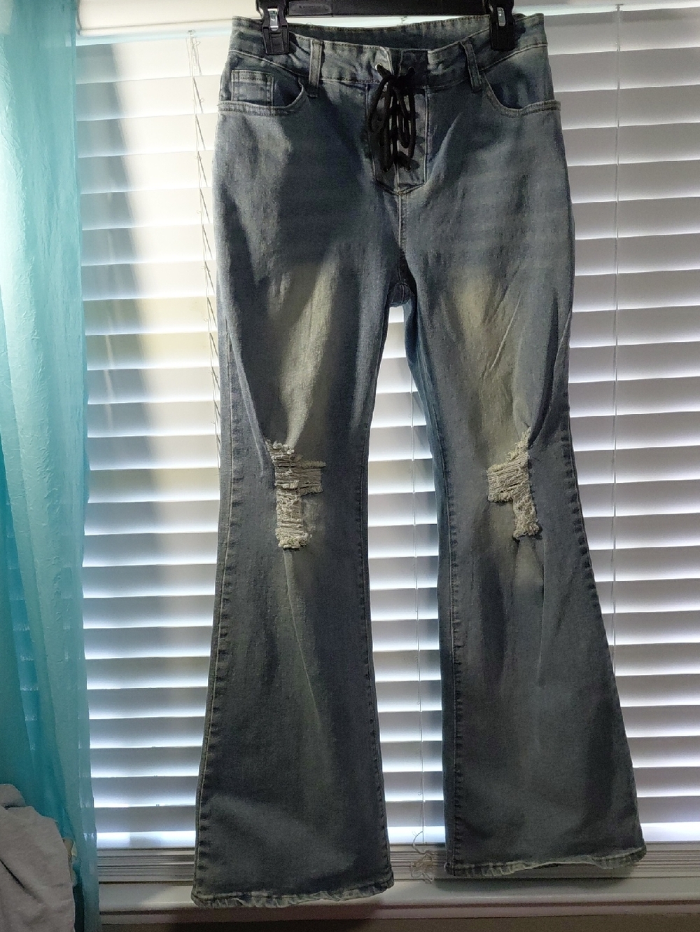 High-Rise Light Blue Distressed Flare Jeans with Lace-Up Waist. Size 31